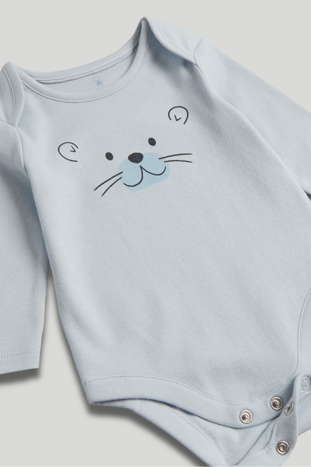 blue long-sleeved bodysuit