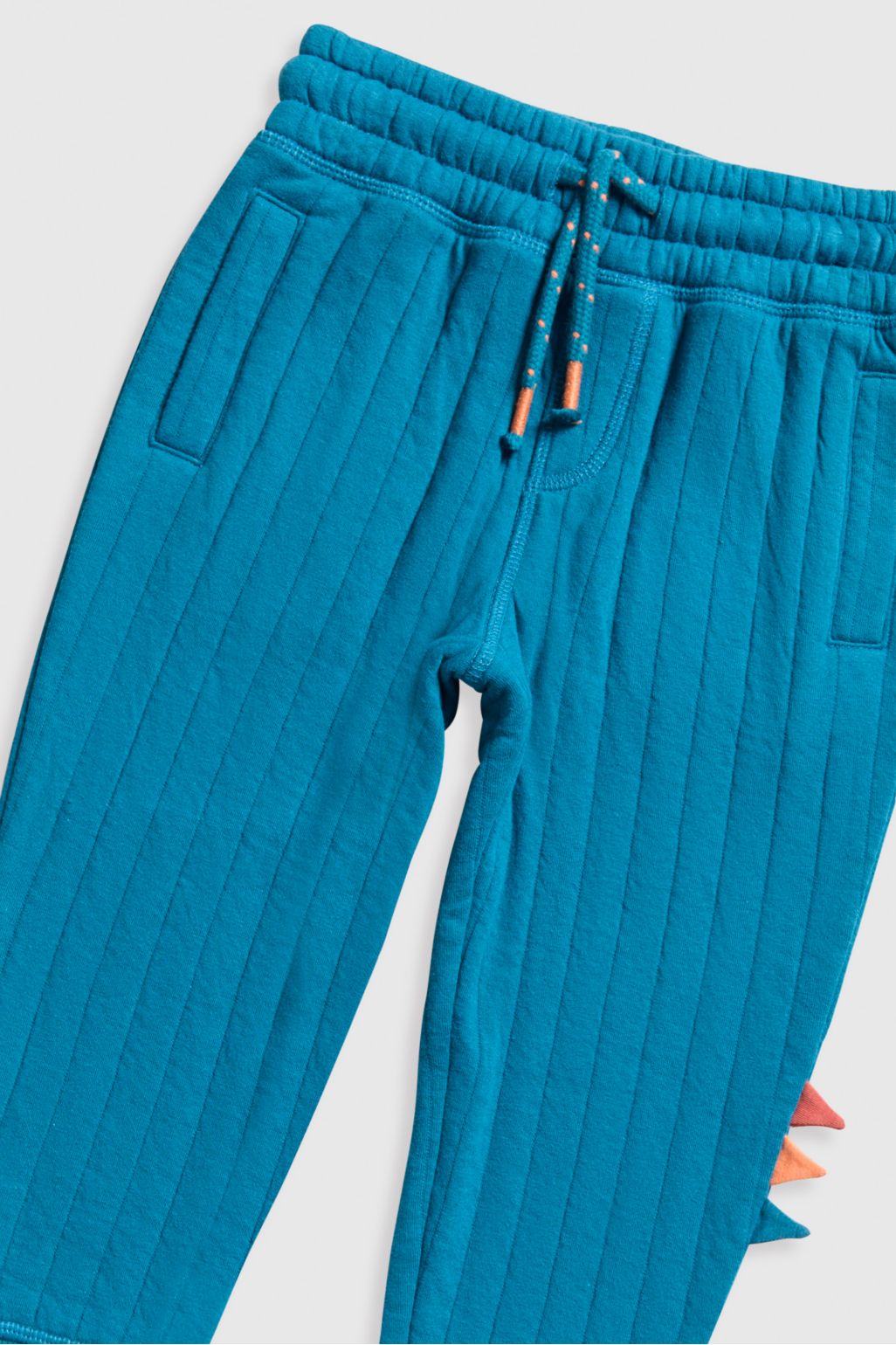 pantaloni sport matlasați, model dinozaur